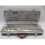 A Buffet three piece silver plated flute in hard carry case