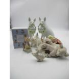 An assortment of pig figurines including Beswick, Lladro & Beatrix Potter
