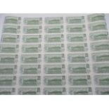 A sheet of uncirculated Canadian $1 bank notes