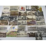 A small collection of vintage postcards including Isle of Wight, Gstaad, Bern & Lausanne -