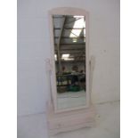 A painted cheval mirror with single drawer under
