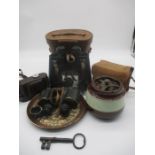 A set of military binoculars marked with arrows, R.E.L/Canada, 1944, H. B. Barnes - with original