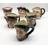 A collection of six Royal Doulton character jugs comprising of Granny, The Cardinal, Paddy, Farmer