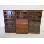 A mahogany Globe-Wernicke style three sectional bookcase with central bureau