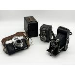 A small collection of cameras including Mamiya, Kodak etc.