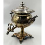 A silver plated Samovar with ebonised handles