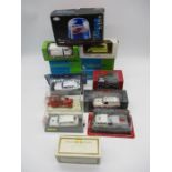 A collection of boxed die-cast vehicles relating to the emergency services including fire engines,