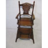A vintage metamorphic child's high chair