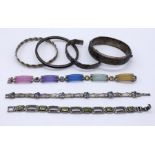 A collection of seven silver and SCM bracelets and bangles