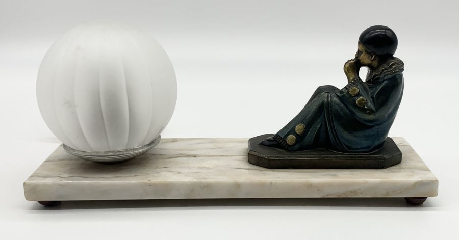 An Art Deco lamp with seated bronze Pierrot figure on marble base