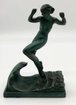 An Art Deco bronze figure titled 'La Vague', by Raymond Guerbe, patinated figure of young female