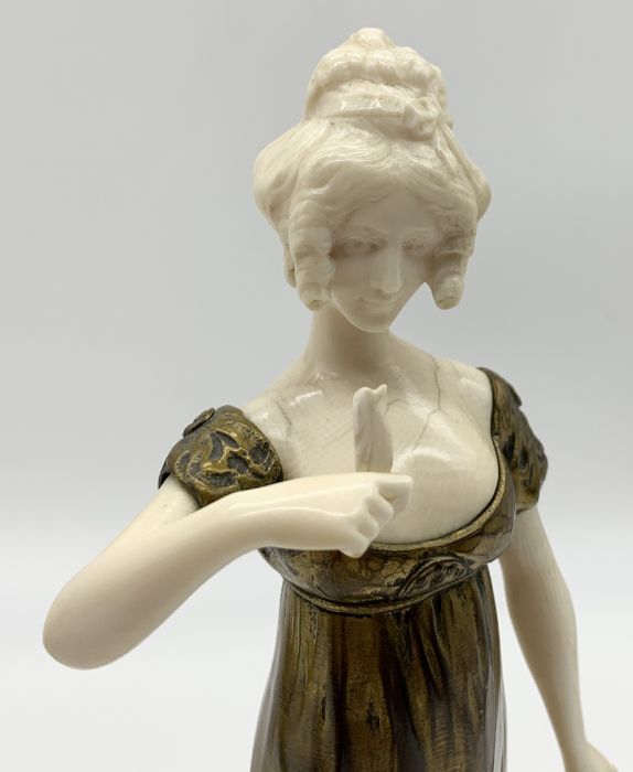 Louis Sosson (fl.1905 - 1930) A gilt bronze and carved ivory figure of a female with a bird on her - Image 5 of 5