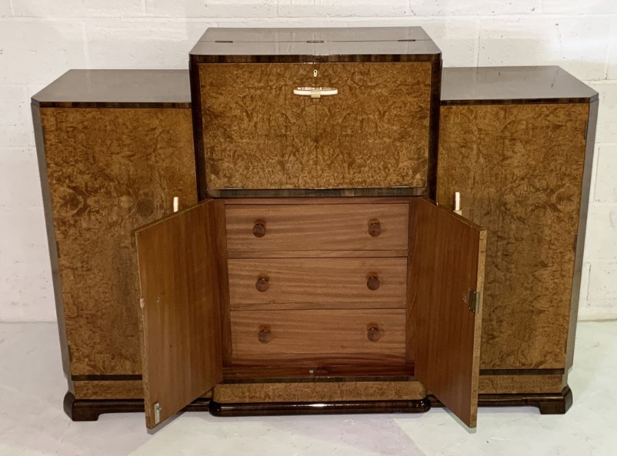 An Art Deco Amboyna cocktail cabinet with lift up top containing original mirror, juicer and - Image 4 of 7