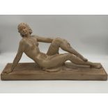A large Art Deco terracotta figure of a nude signed Cipriani 66cm x 35cm