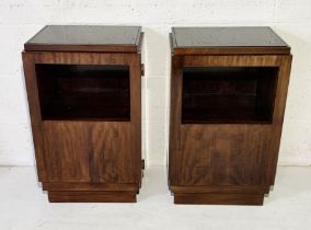 A pair of Art Deco rosewood bedside cabinets with glass tops