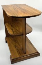 An Art Deco walnut three tiered side table