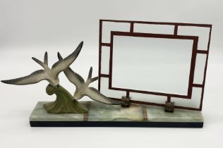 An Art Deco picture frame on onyx base with two spelter seagulls 22cm x 38cm x 8cm