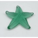 A signed Lalique green glass starfish paperweight
