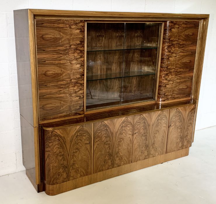 An Art Deco burr walnut bookcase with sliding glass doors and multiple cupboards - Image 2 of 5