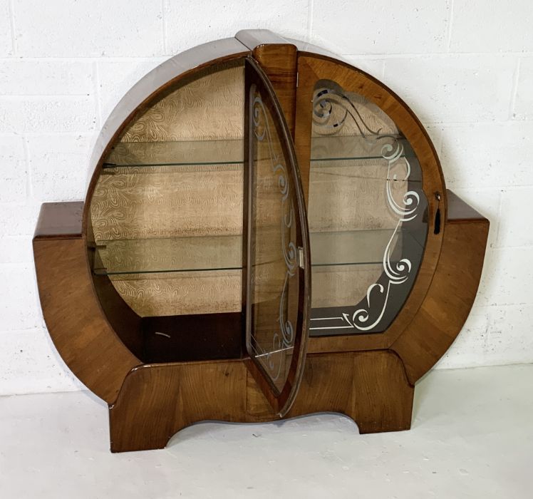 An Art Deco walnut veneered circular display cabinet enclosing two shelves and silk-lined back. - Image 4 of 5