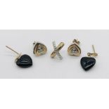 A pair of heart shaped 9ct gold earrings set with diamonds (2.1g) along with a pair of black onyx