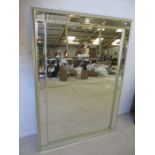 An Art Deco style mirror, overall size 107cm x 75cm.