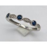 A 9ct white gold sapphire and diamond dress ring