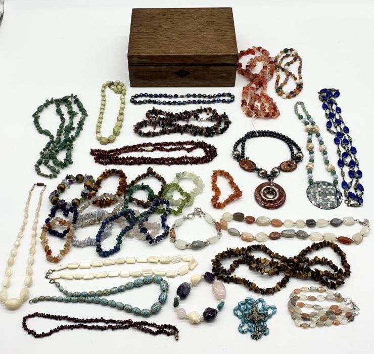 A collection of mainly vintage hardstone and glass jewellery in wooden box