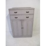 A painted tall boy with two drawers and a cupboard under. Height 126cm, width 84cm & depth 48cm