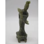 A Chinese carved jade figure of a female, height 12cm