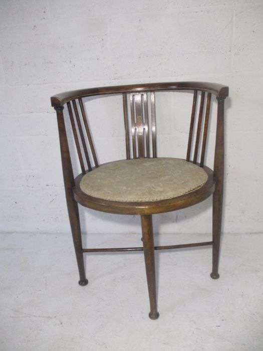 An Edwardian tub chair, initialled on bottom A.L.