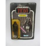 A Kenner Star Wars Return Of The Jedi "Darth Vader" figurine (No 38230) in original packing.