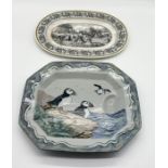 A large platter by Highland Stoneware decorated with Puffins and a Villeroy & Boch meat platter