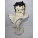 A large resin figurine of Betty Boop in a Marilyn Monroe pose - overall approx. height 90cm