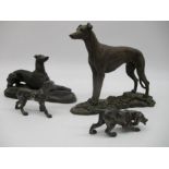 Two resin figures of greyhounds along with two silver plated hounds