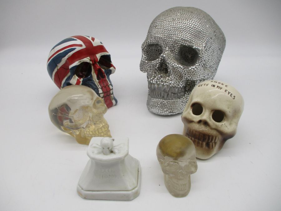 A collection of novelty skull ornaments