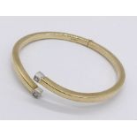 A 9ct gold bangle style bracelet, weight 10.7g