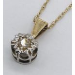 A 9ct gold diamond pendant on 9ct chain