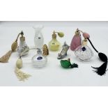 A collection of glass scent bottles including Caithness, Edinburgh Crystal etc