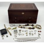 A small collection of mainly 925 silver costume jewellery in a Mele & Co. wooden jewellery box