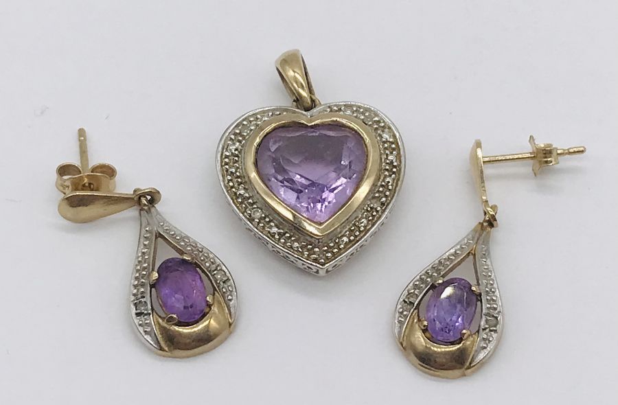 A 9ct gold heart shaped pendant with earrings set with amethysts and diamonds, total weight 6.1g