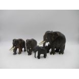 A collection of ebony elephants.