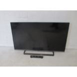 A Panasonic LCD TV and remote, model no. TX-40CS520B