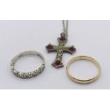A 9ct gold wedding band along with a 9ct eternity ring and a silver gem set cross on chain (total