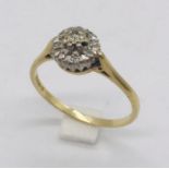 An 18ct gold diamond cluster ring