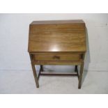 A mahogany clerks desk with a single drawer under. 77cm x 45cm, height 106cm