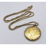 A Victorian full sovereign dated 1900 loose mounted in a 9ct gold setting with 9ct chain, total