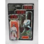 A Palitoy Star Wars Return Of The Jedi "AT-ST Driver" figurine in original packing with trilogo