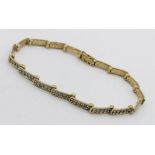 A 9ct gold bracelet set with diamonds, total weight 8.2g