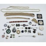 A small collection of costume jewellery including a 9ct gold padlock and earrings- total gold weight